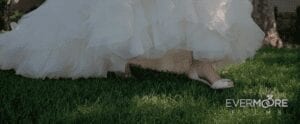 The bride...approaching her groom for their First Look | www.EvermooreFilms.com